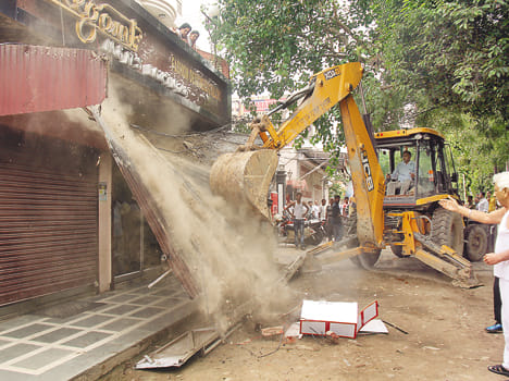Bulldozers charged into illegal encroachments