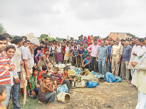 The wine-making villagers take oath