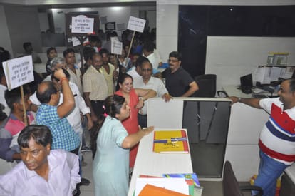 People protest against omax for not giving their money back.