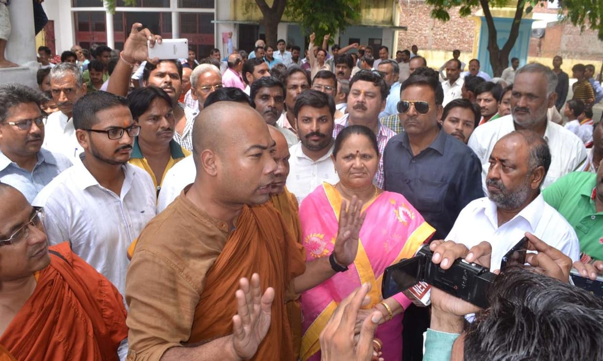 Dhamma Buddhist monastery in the opposition , the program stopped