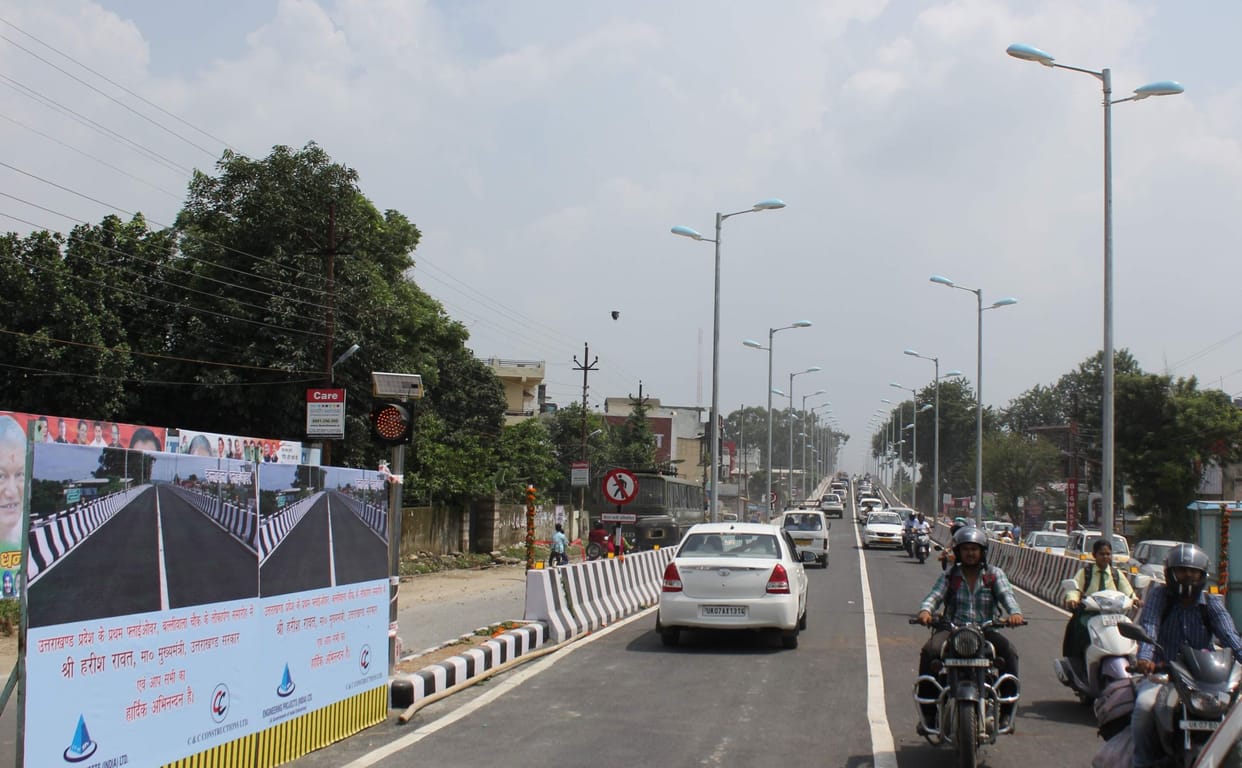 A car after losing control falls from flyover in Raidurgam in Hyderabad