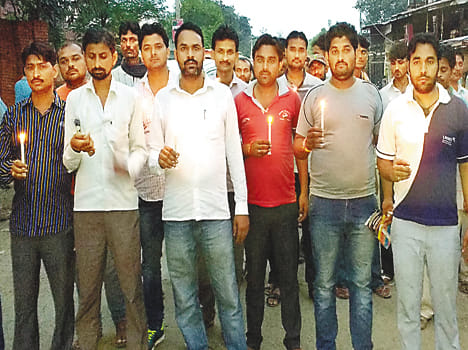 Candle march by the people of the town