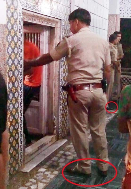 Wear shoes on entering the temple police getting trounced