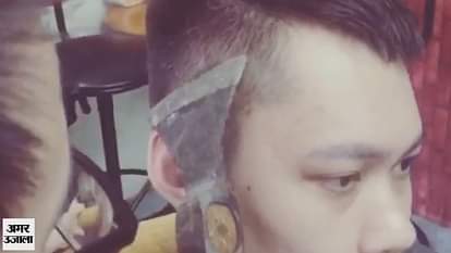 OMG! Man gives hair cut with axe