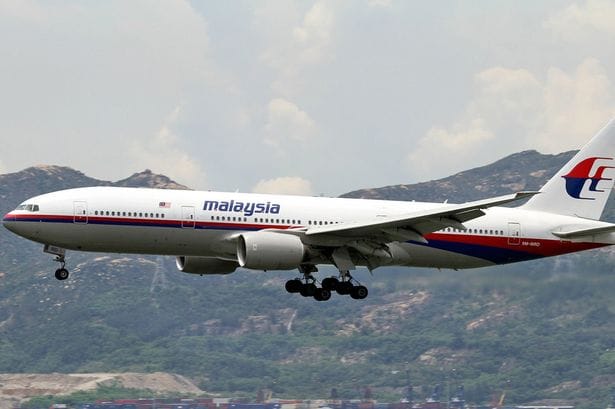 searchers to end probe of MH 370 