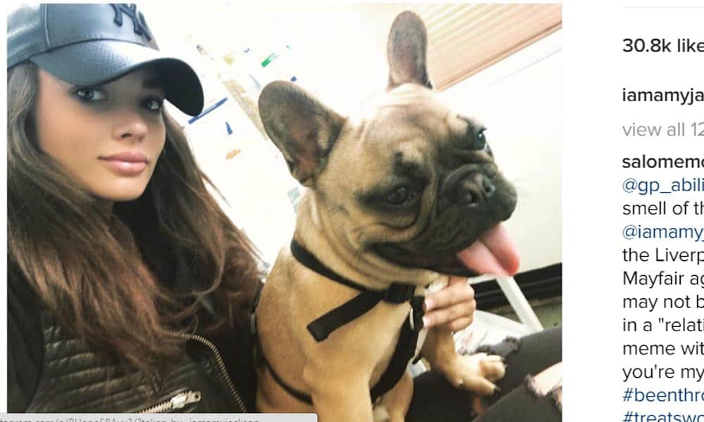 Amy jackson sleep with her dog