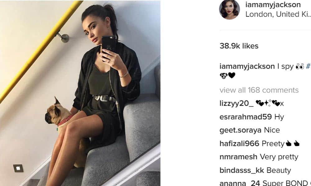 Amy jackson sleep with her dog