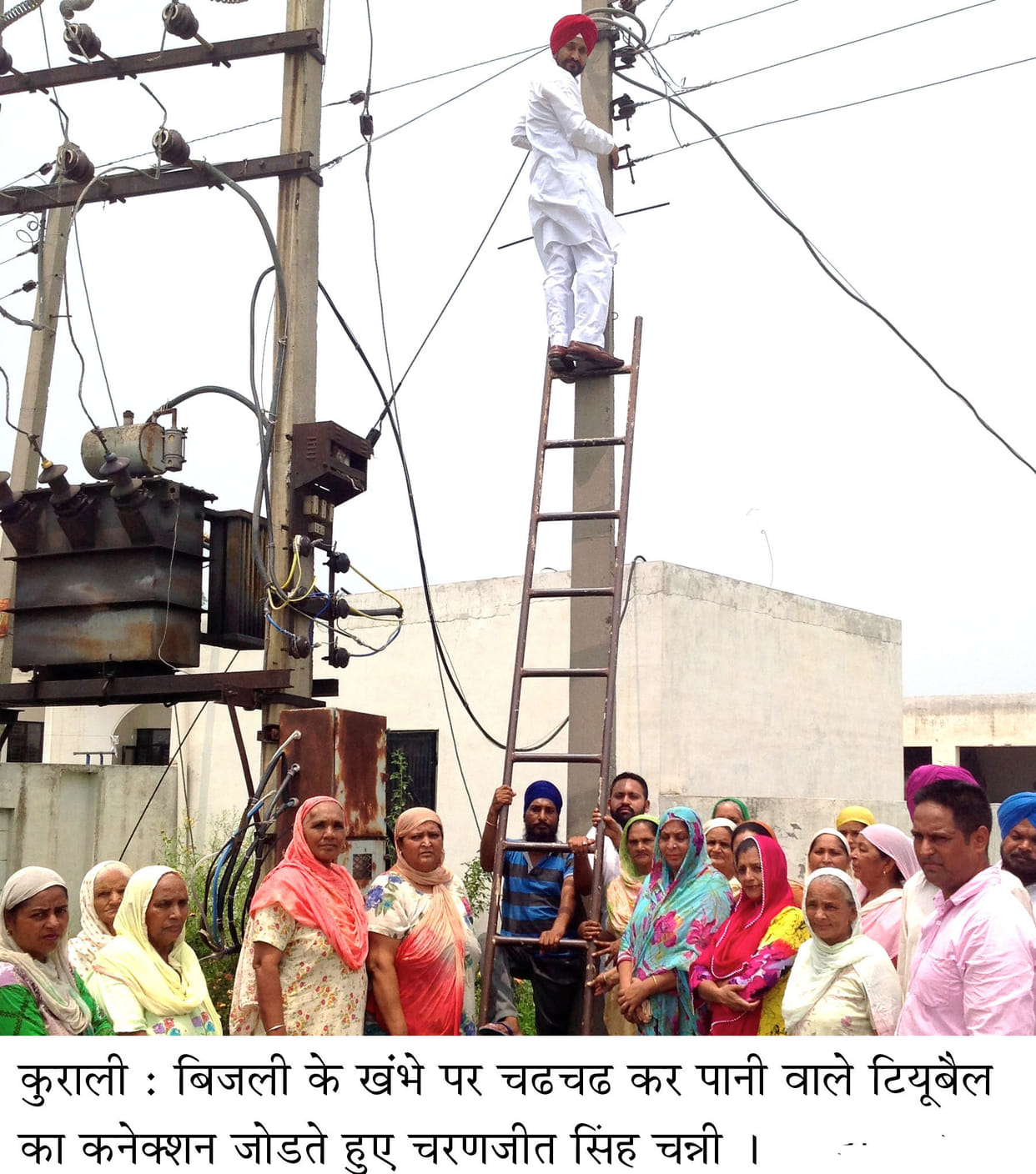 Opposition leader CHANNI mounting electrical connection on pole