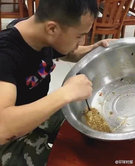 Chinese firefighter eats up a whole pot of noodles