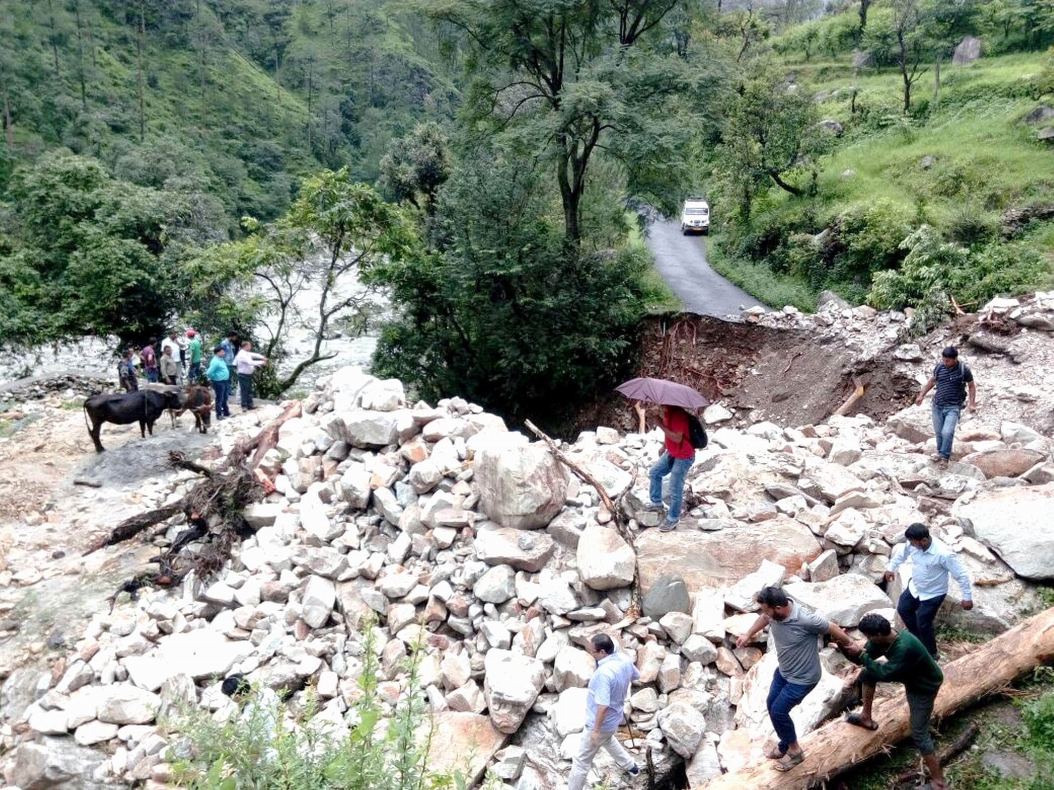 roads washed away in uttarakashi due heavy rain.