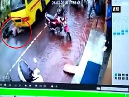 Watch: Motorcycle rider run over by bus, escapes unhurt