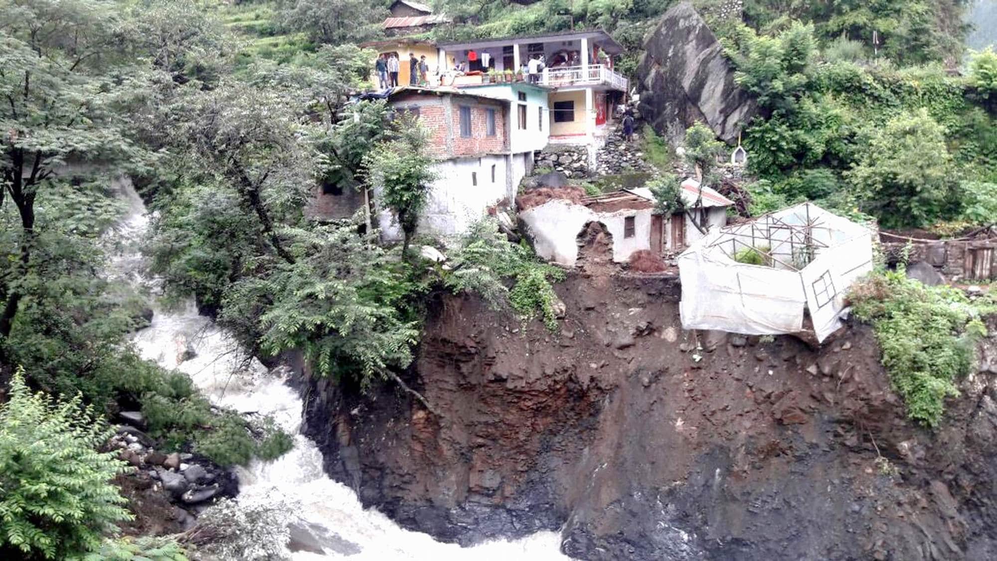 roads washed away in uttarakashi due heavy rain.