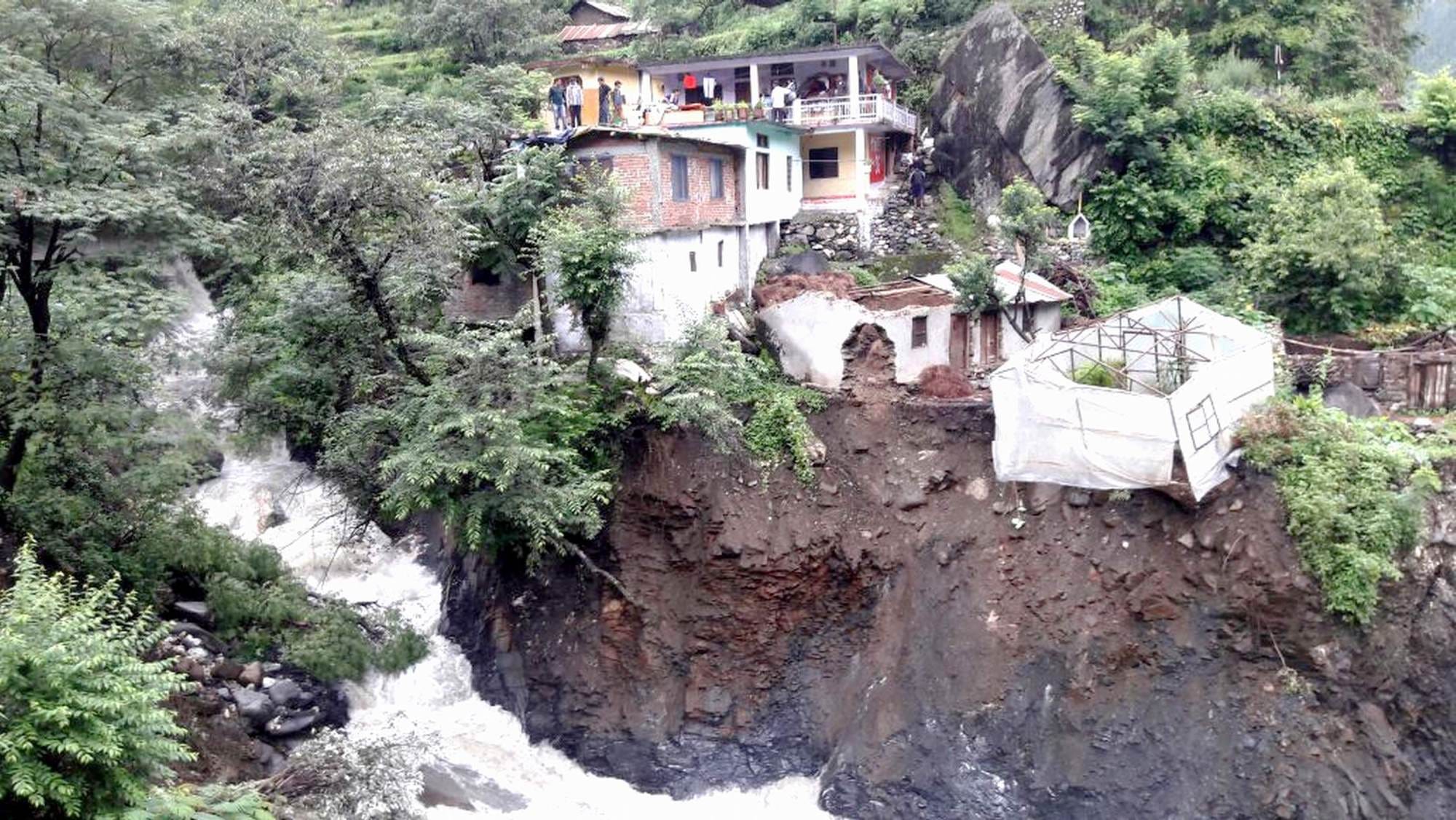 roads washed away in uttarakashi due heavy rain.