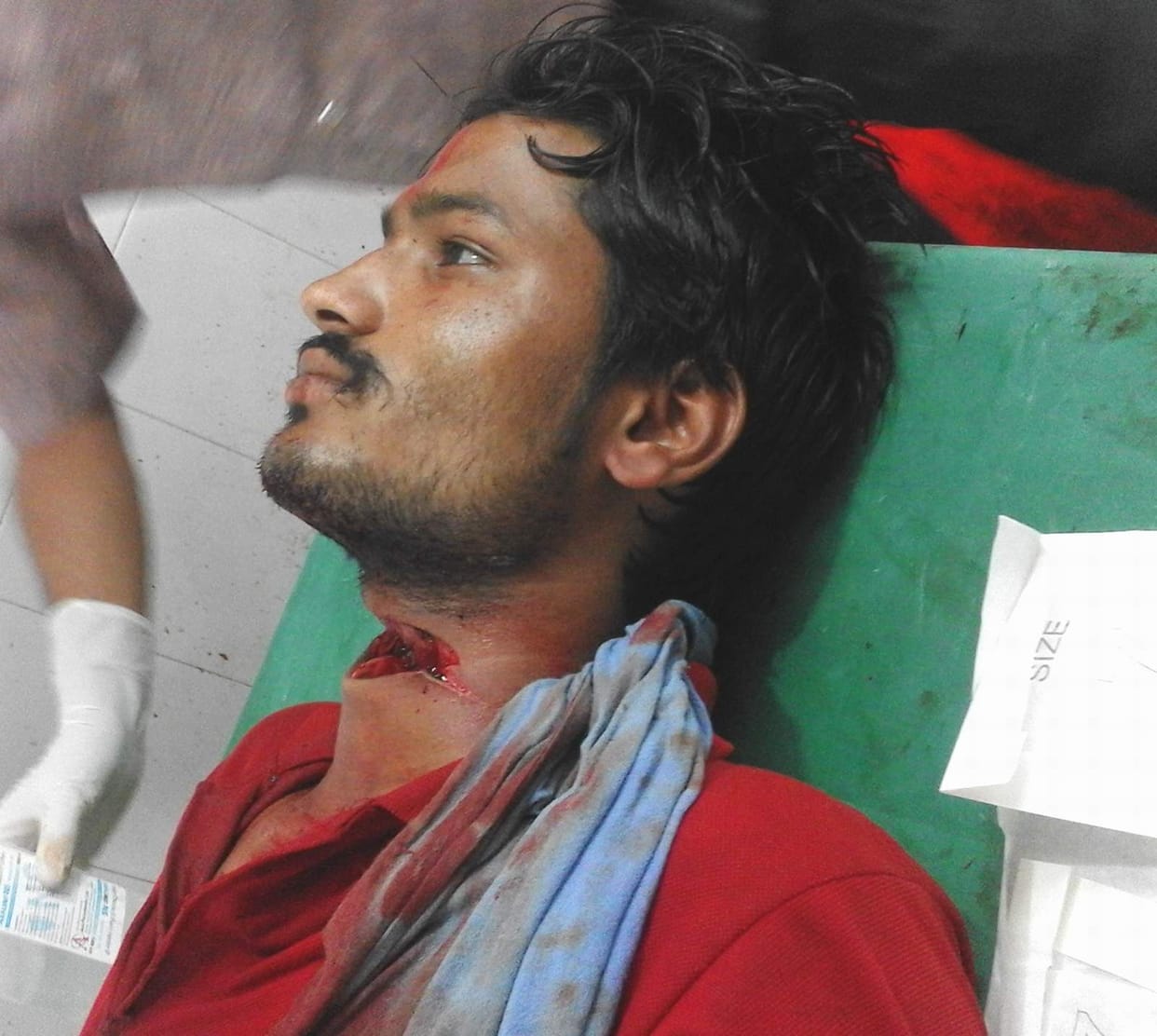 young man throad cut in mysterious circumstances
