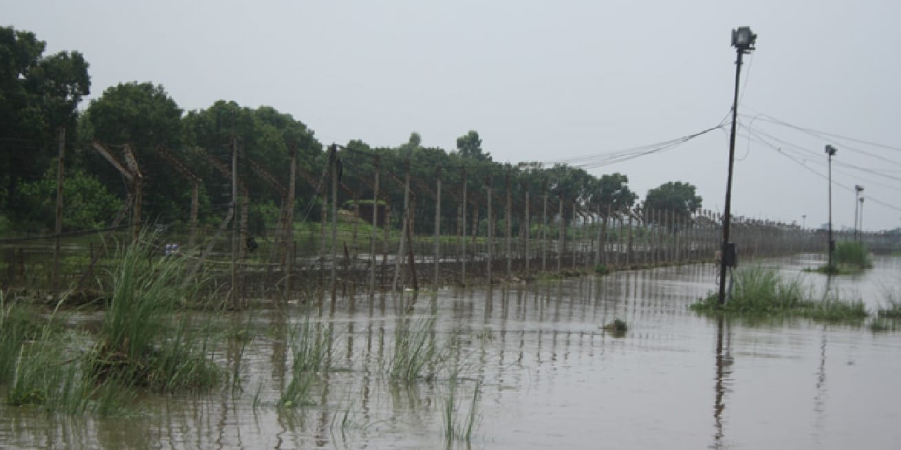 soldier trying to removing water from posts