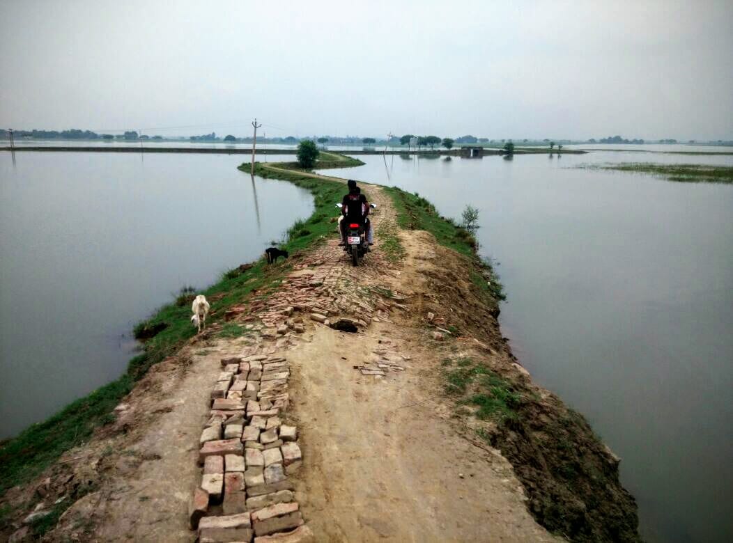 People suffering from flooding, is not the first intersection