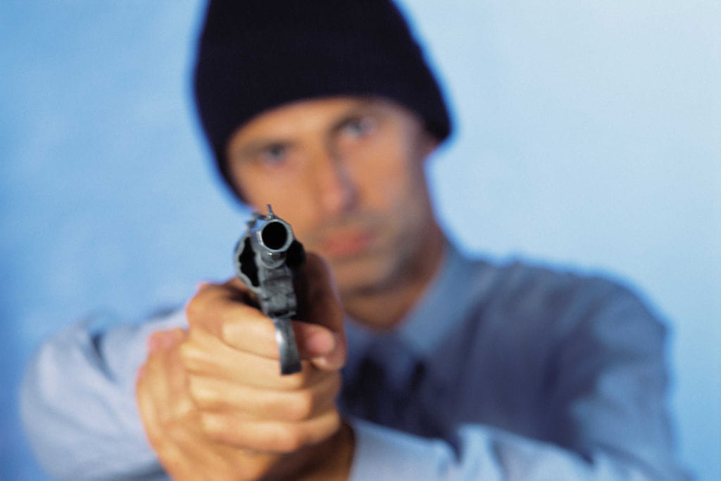 loot with businessman on gunpoint
