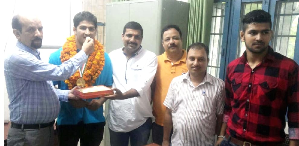 Pankaj Mankotia wins Gold medal in National Open Belt wrestling.