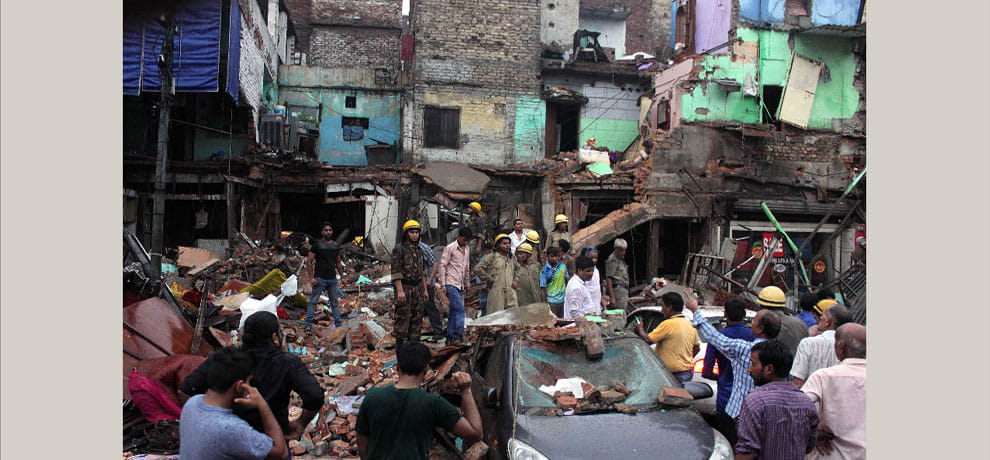 The three-storey building collapsed in Karol Bagh, sons elderly woman buried under debris