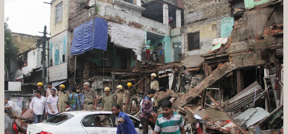 The three-storey building collapsed in Karol Bagh, sons elderly woman buried under debris