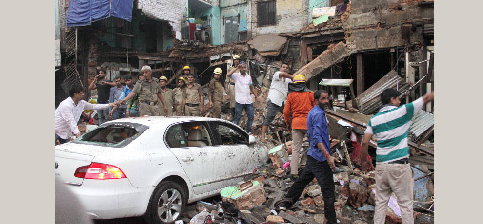 The three-storey building collapsed in Karol Bagh, sons elderly woman buried under debris