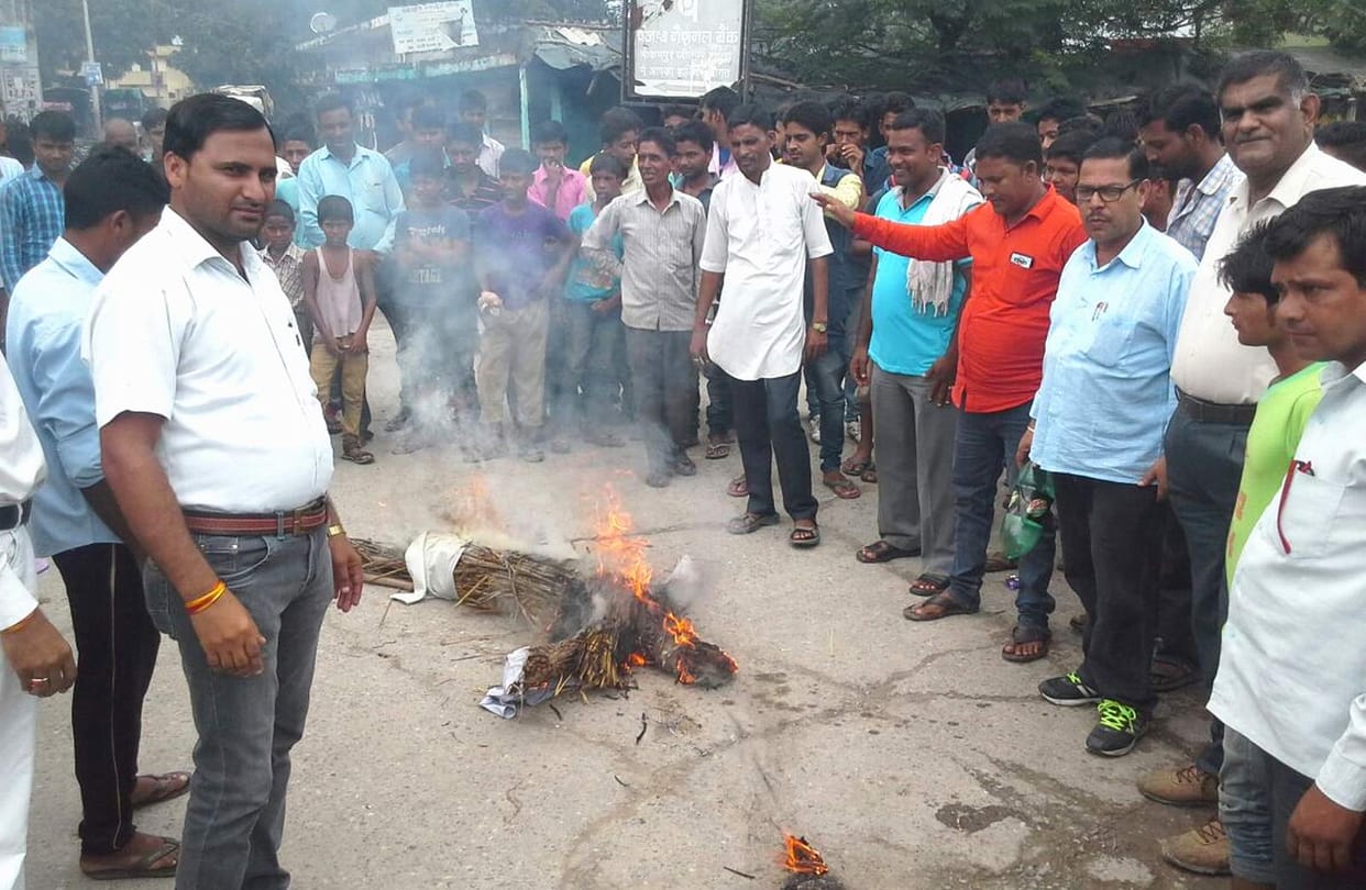 effigy of centre government burnt in protest of price hike