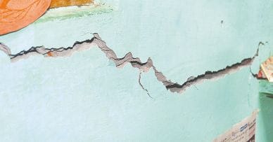 Rain-cracked houses, people in panic