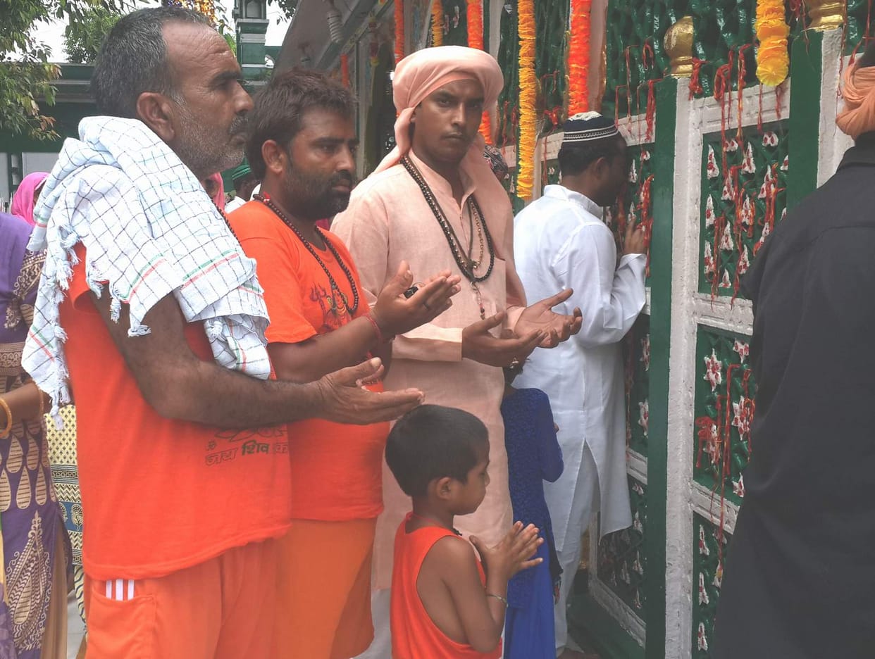 Scaling the wall to give the message of harmony of religion