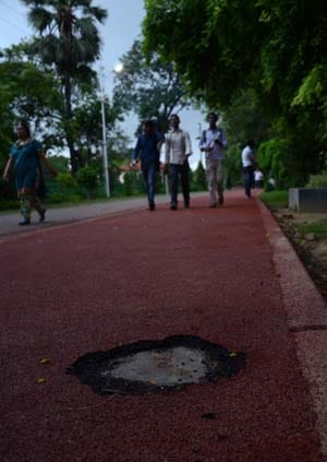 On jogging tracks, allowing only sports shoes 