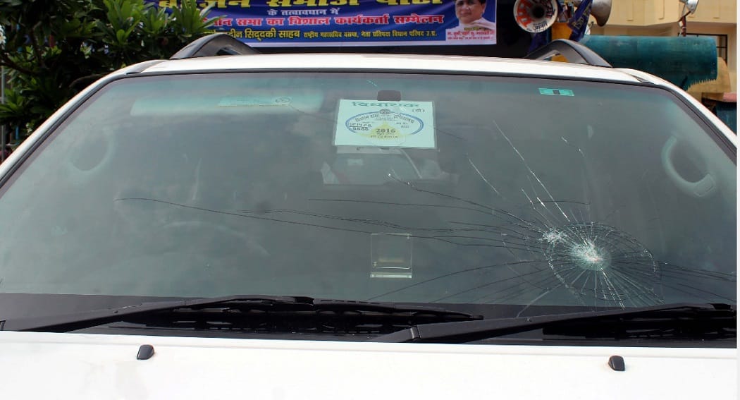 car looted by tying driver