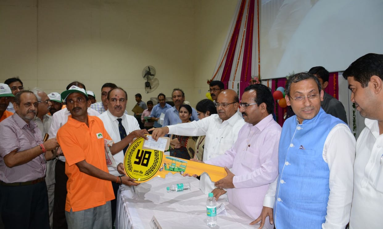 The minister distributed e-rickshaw to scavengers 