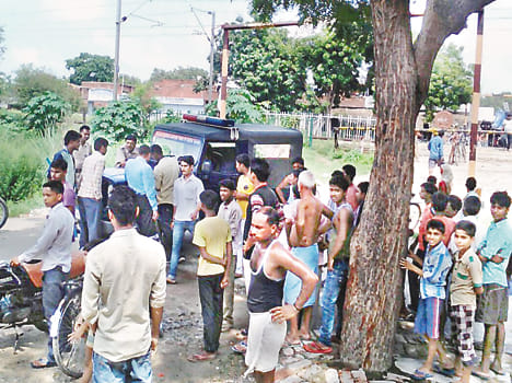 gateman denied to open the gate, beaten