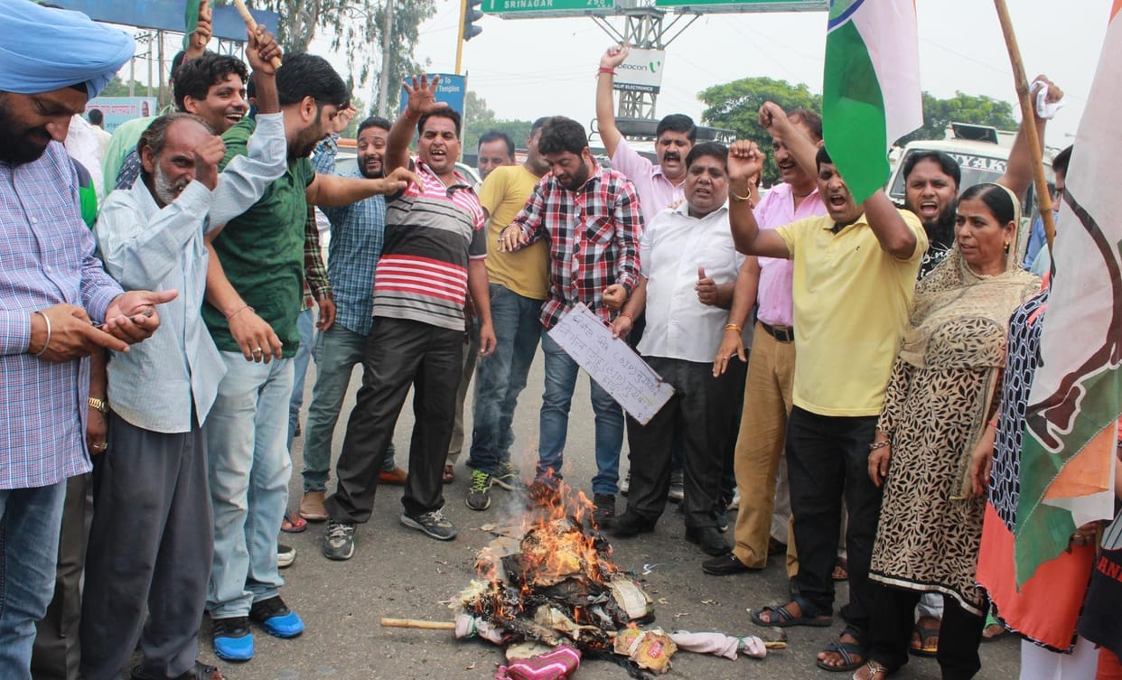 protest against deputy cm nirmal singh 
