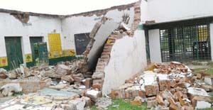 Primary School Building, demolished , child survived , resembled chaos