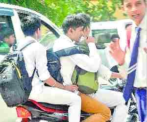 Boys violating traffic rules