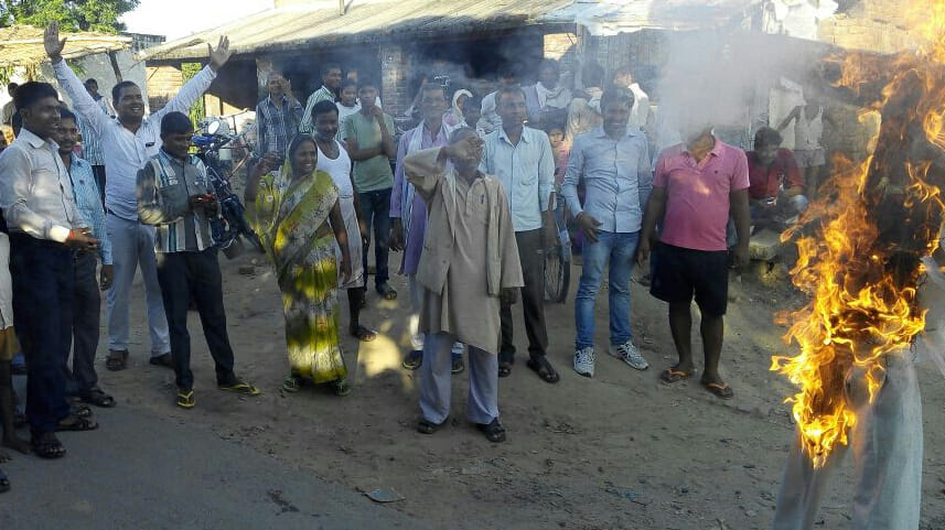 Burnt effigies of State