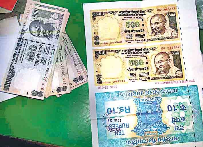 young man caught for make currency