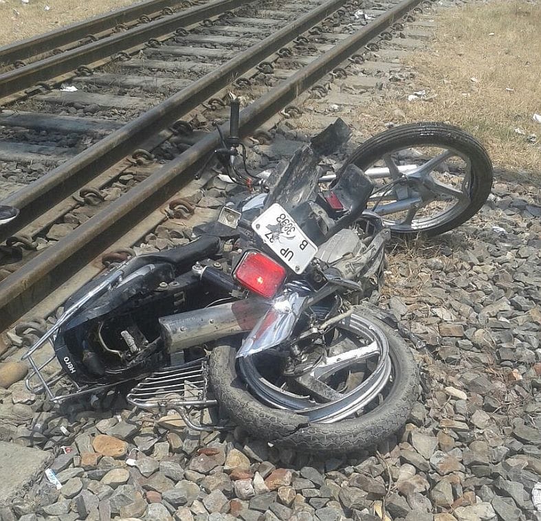 bike rider killed by train.