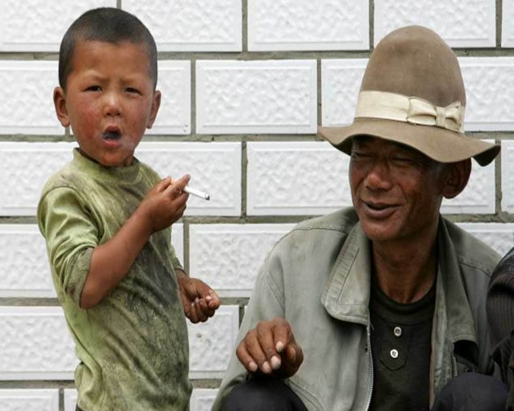 Child Smokers In Indonesia