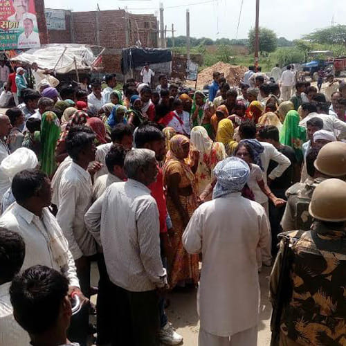 protest over two youth beaten to death by police in mainpuri