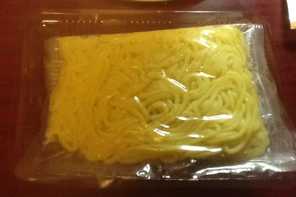 noodle snack with a picture of a bikini-clad woman