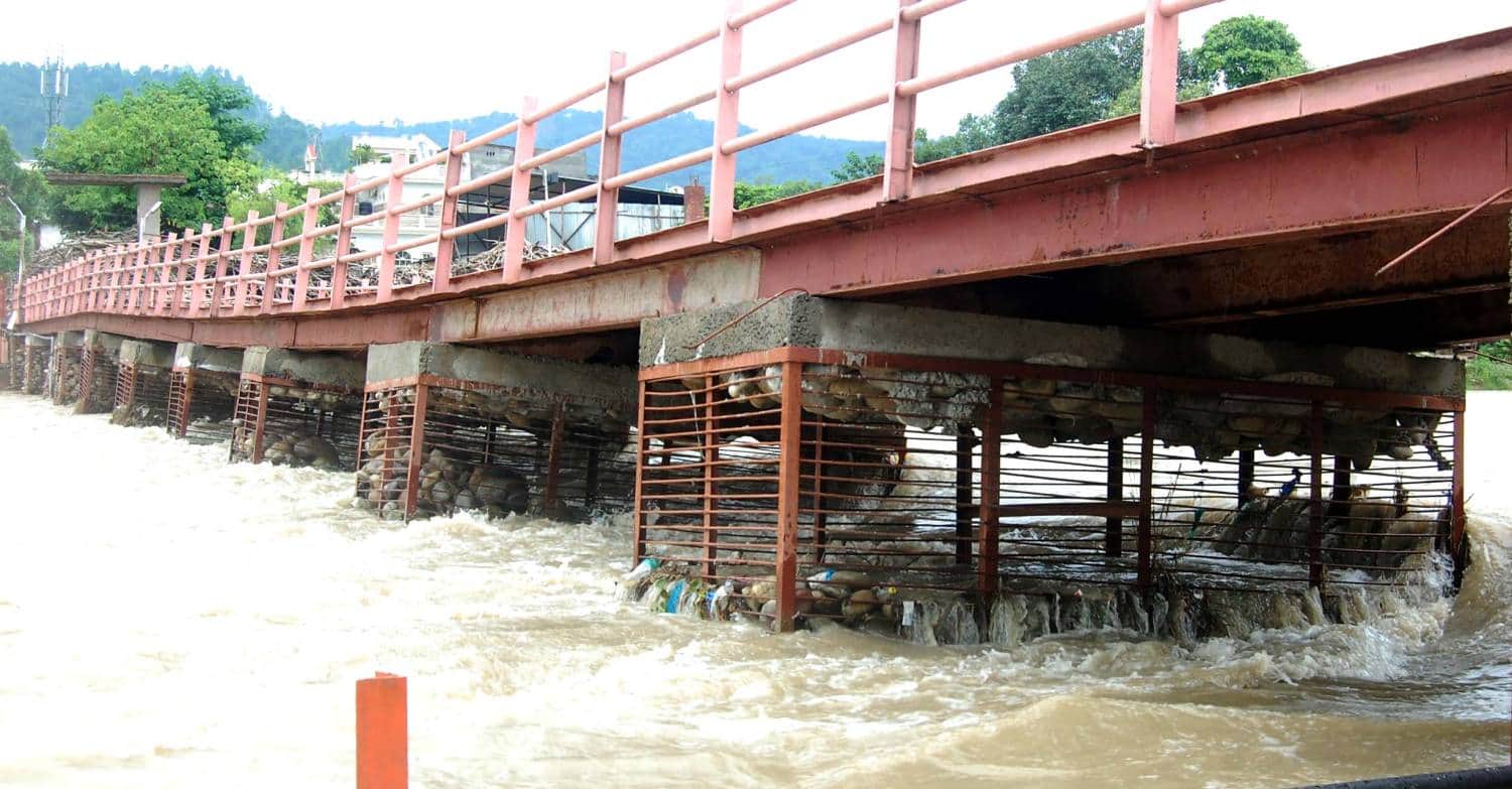 bridge inclined toward due to rising water level of ganges 