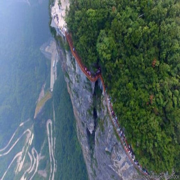 Don't look down: Glass walkway hugs mountain in China