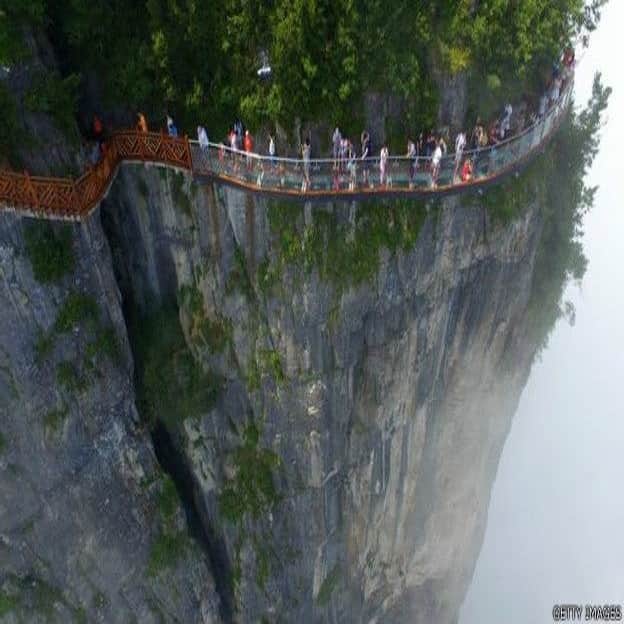 Don't look down: Glass walkway hugs mountain in China
