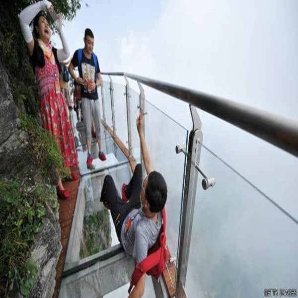 Don't look down: Glass walkway hugs mountain in China