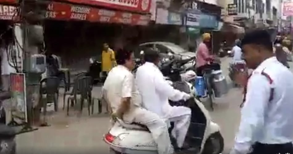 bjp minister anil vij break traffic rules by driving activa without helmet in ambala