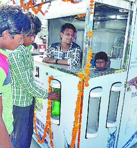 give money take water at railway station