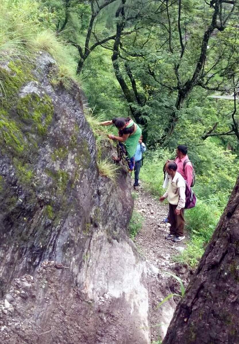 people walking on danger track to go home.