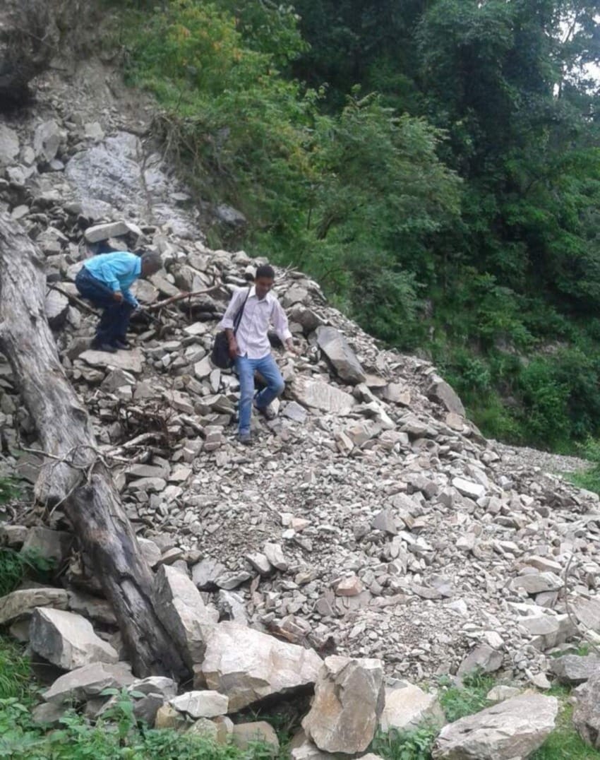 people walking on danger track to go home.