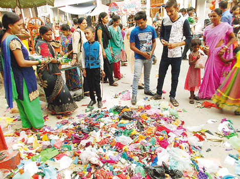 beat doll with adult children on Nag Panchami